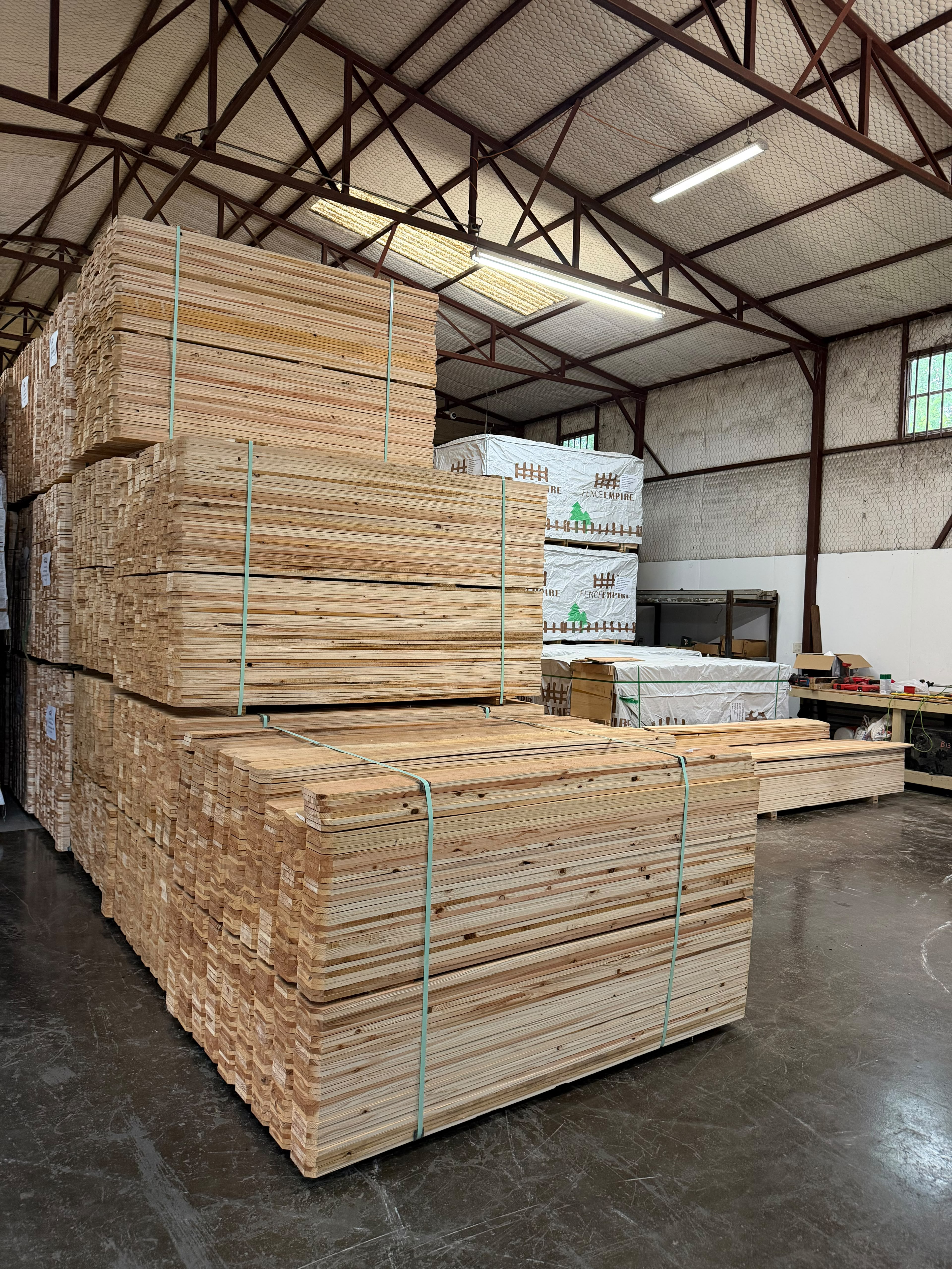 Cedar boards stacked in warehouse